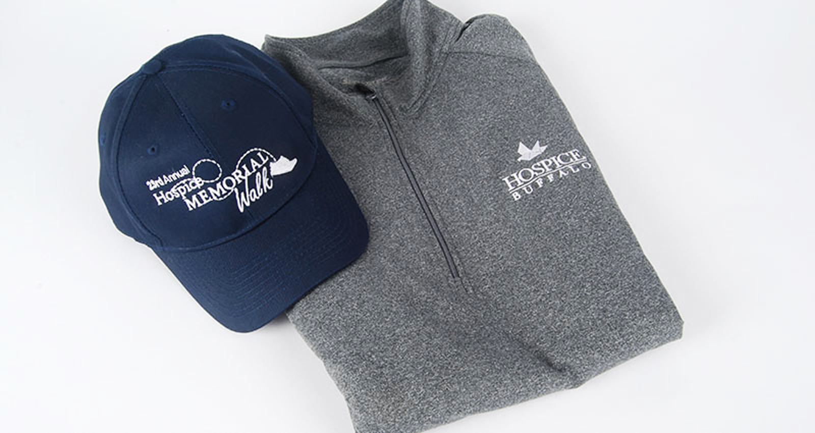 Hospice Buffalo hat and sweater corporate merch