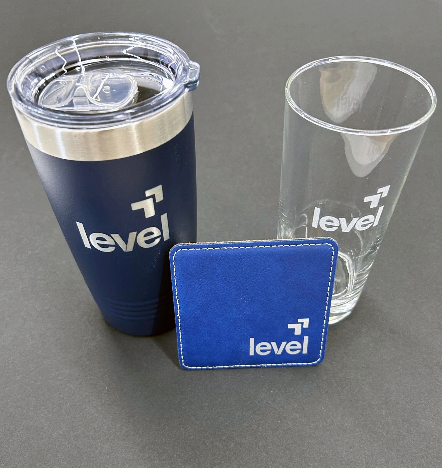Level Financial tumbler, pint glass corporate merchandise