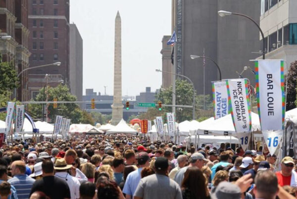crowds at taste of buffalo with vendor signage printed by beyond print solutions