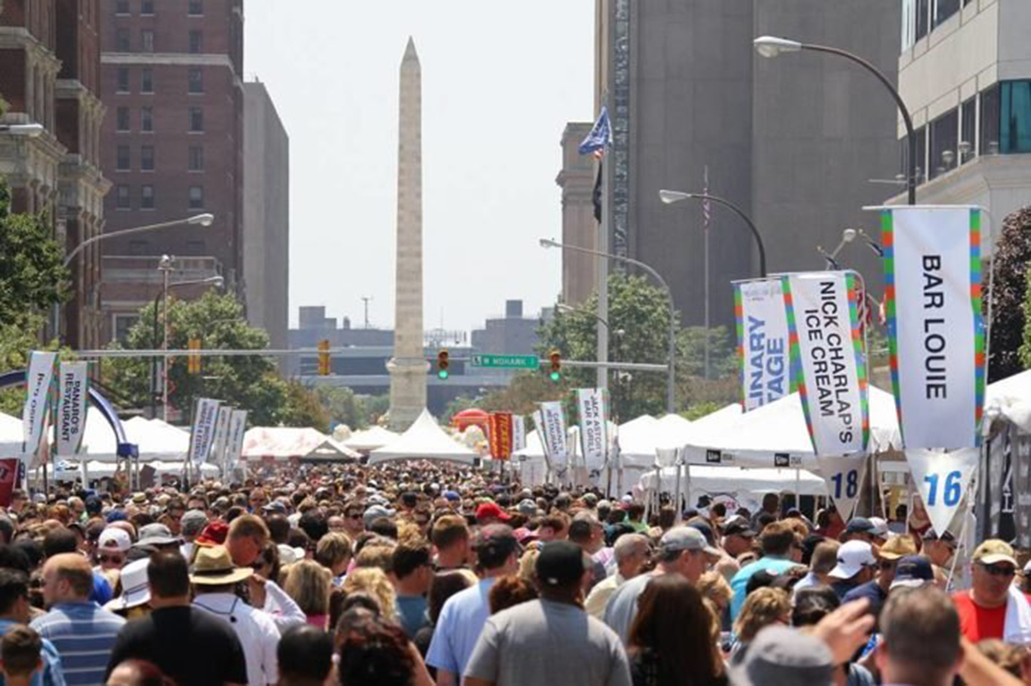 crowds at taste of buffalo with vendor signage printed by beyond print solutions